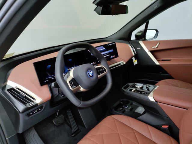 new 2025 BMW iX car, priced at $98,335