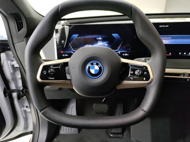 new 2025 BMW iX car, priced at $94,075