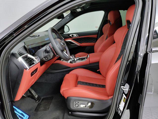 new 2025 BMW X6 M car, priced at $139,710