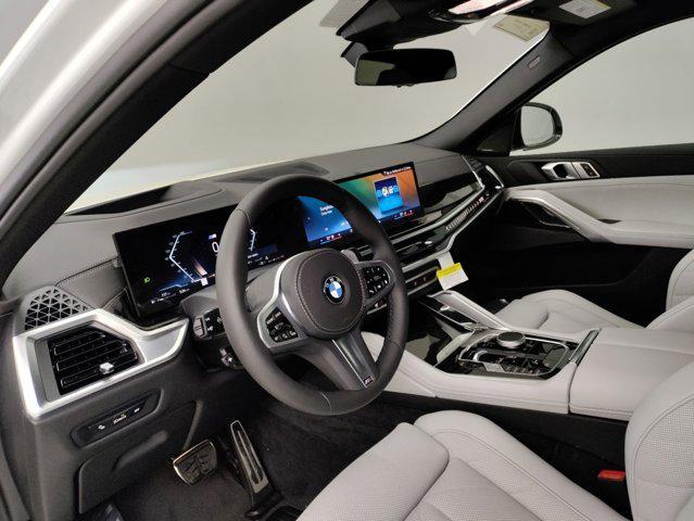 new 2025 BMW X6 car, priced at $81,925