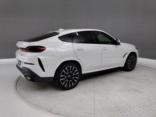 new 2025 BMW X6 car, priced at $81,925