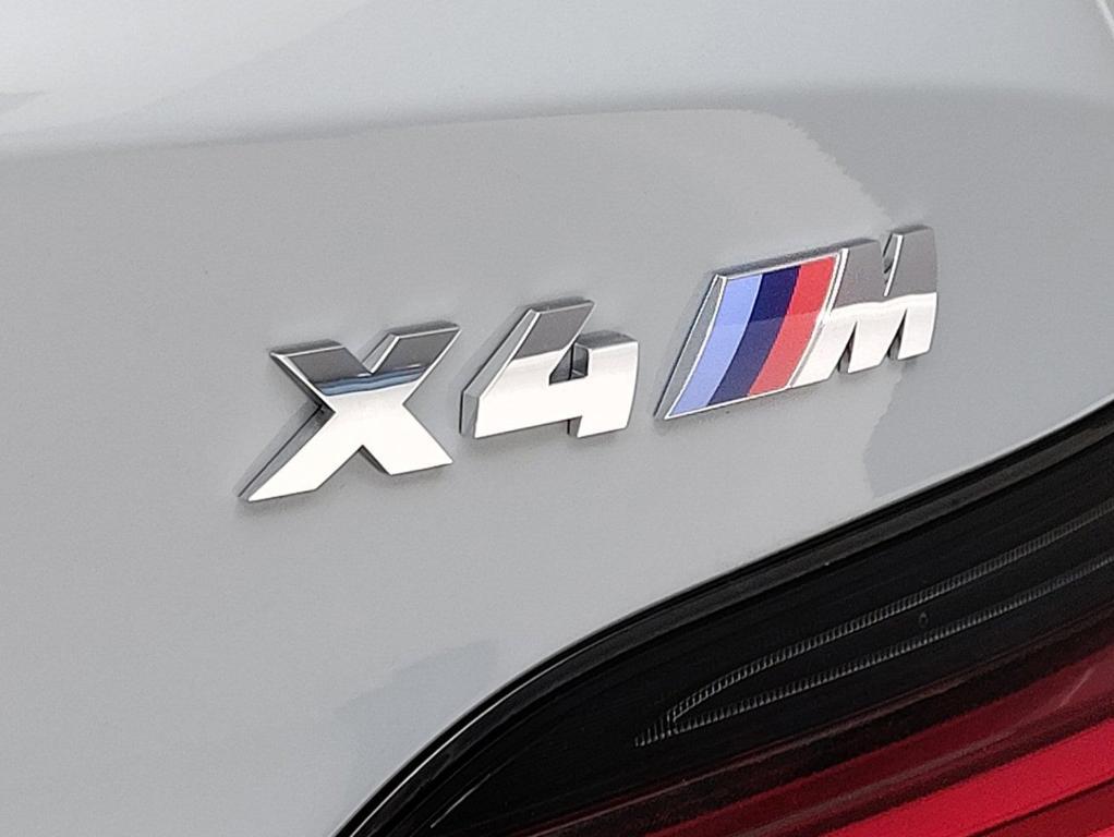 new 2024 BMW X4 M car, priced at $89,665