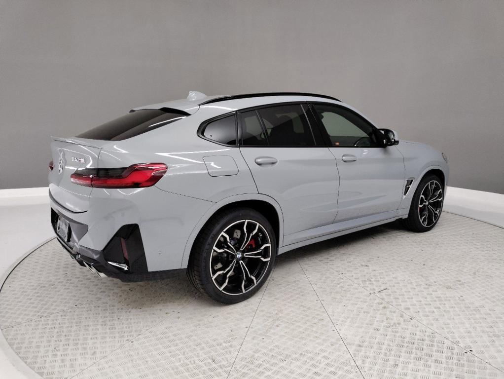 new 2024 BMW X4 M car, priced at $89,665