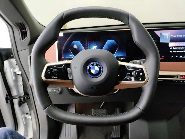 new 2025 BMW iX car, priced at $98,075