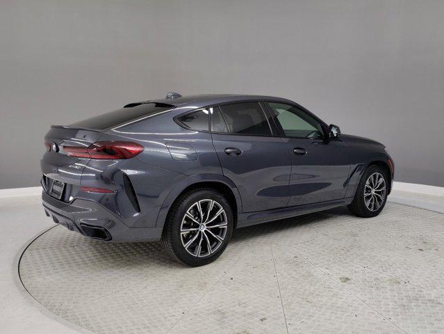 used 2022 BMW X6 car, priced at $55,499