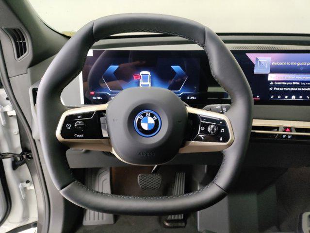 new 2025 BMW iX car, priced at $94,275