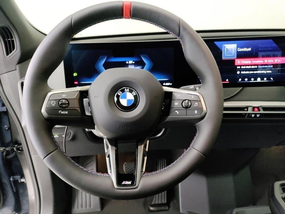 new 2025 BMW iX car, priced at $117,145