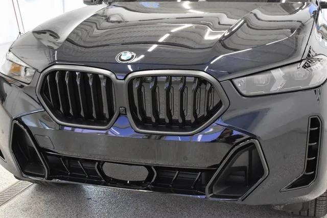 new 2025 BMW X6 car, priced at $82,825