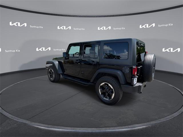 used 2015 Jeep Wrangler Unlimited car, priced at $16,795
