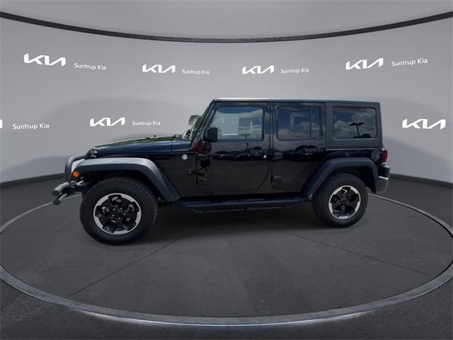 used 2015 Jeep Wrangler Unlimited car, priced at $16,795