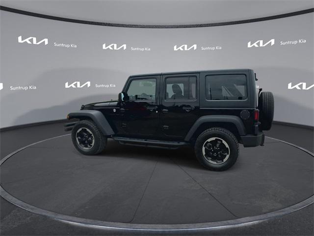 used 2015 Jeep Wrangler Unlimited car, priced at $17,743