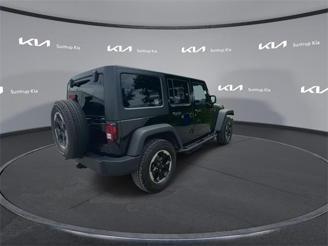 used 2015 Jeep Wrangler Unlimited car, priced at $17,743