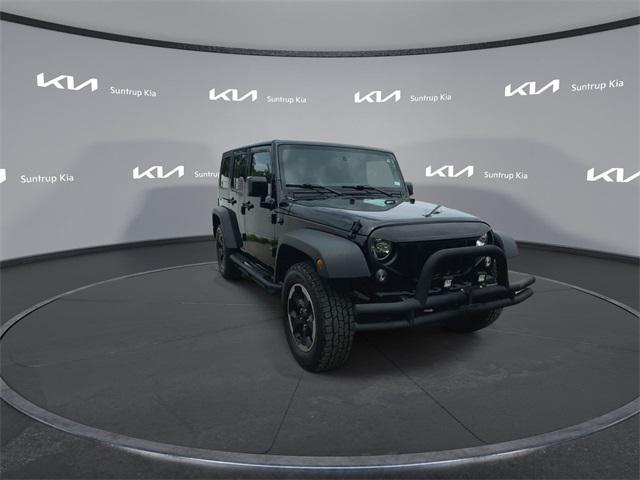 used 2015 Jeep Wrangler Unlimited car, priced at $17,743