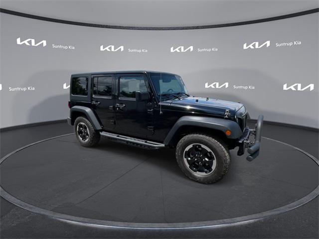 used 2015 Jeep Wrangler Unlimited car, priced at $16,795