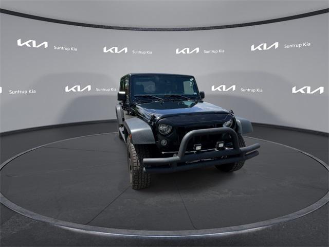 used 2015 Jeep Wrangler Unlimited car, priced at $16,795