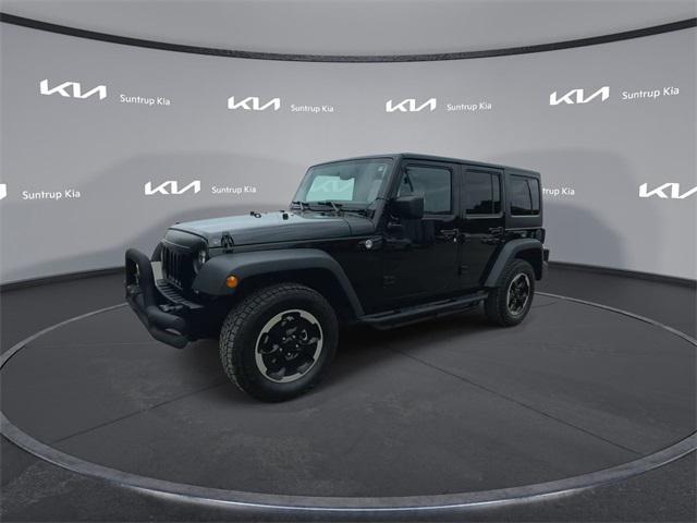 used 2015 Jeep Wrangler Unlimited car, priced at $17,743