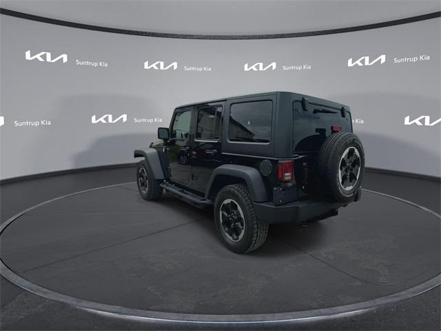used 2015 Jeep Wrangler Unlimited car, priced at $17,743