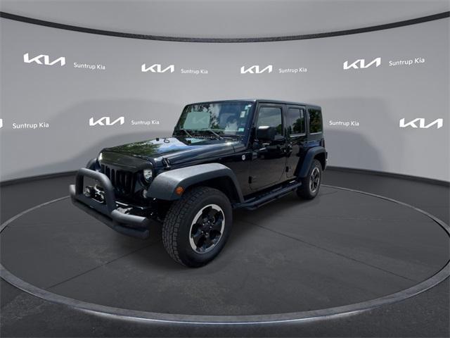 used 2015 Jeep Wrangler Unlimited car, priced at $16,795
