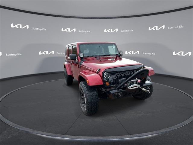 used 2011 Jeep Wrangler Unlimited car, priced at $14,995