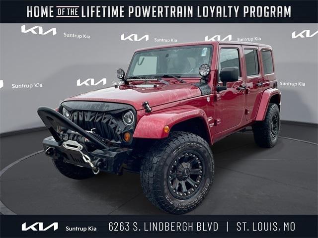 used 2011 Jeep Wrangler Unlimited car, priced at $14,995