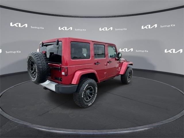 used 2011 Jeep Wrangler Unlimited car, priced at $14,995