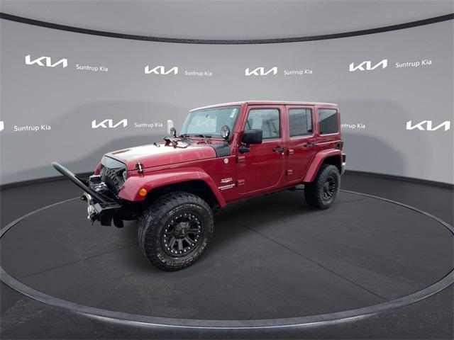 used 2011 Jeep Wrangler Unlimited car, priced at $14,995