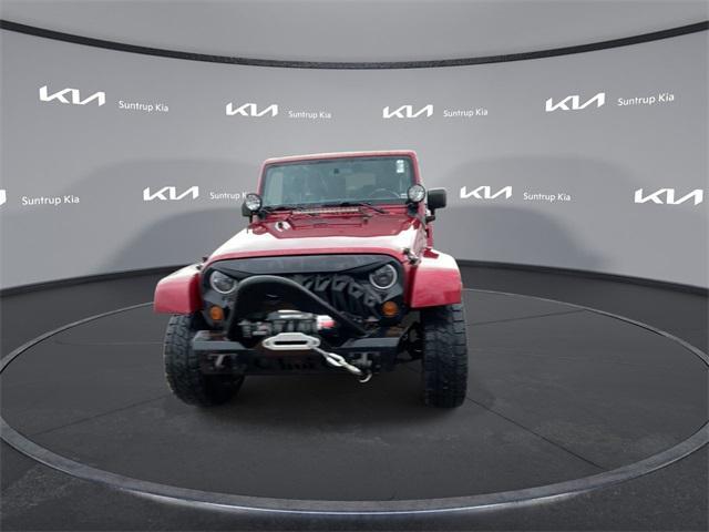 used 2011 Jeep Wrangler Unlimited car, priced at $14,995