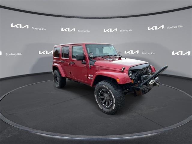 used 2011 Jeep Wrangler Unlimited car, priced at $14,995