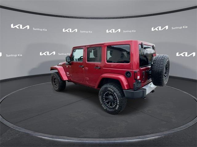 used 2011 Jeep Wrangler Unlimited car, priced at $14,995