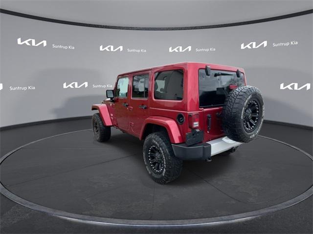 used 2011 Jeep Wrangler Unlimited car, priced at $14,995