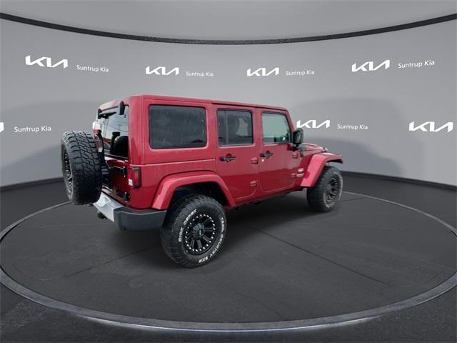 used 2011 Jeep Wrangler Unlimited car, priced at $14,995