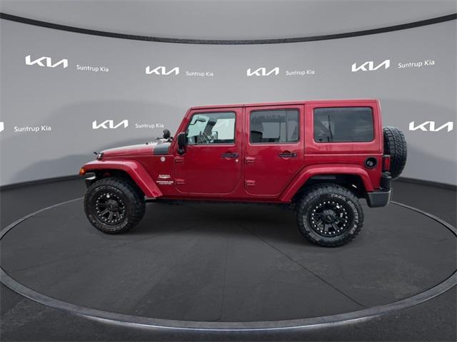 used 2011 Jeep Wrangler Unlimited car, priced at $14,995