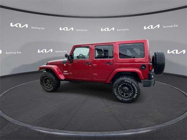 used 2011 Jeep Wrangler Unlimited car, priced at $14,995