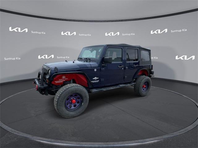 used 2012 Jeep Wrangler Unlimited car, priced at $14,995