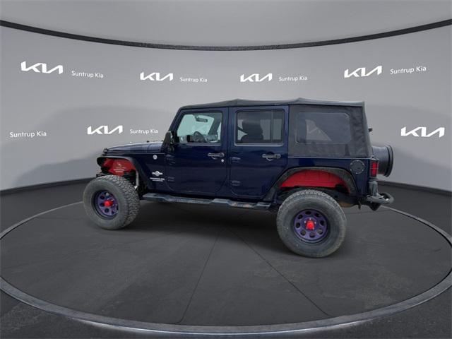 used 2012 Jeep Wrangler Unlimited car, priced at $14,995