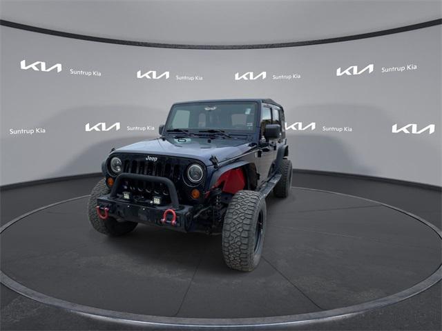 used 2012 Jeep Wrangler Unlimited car, priced at $14,995