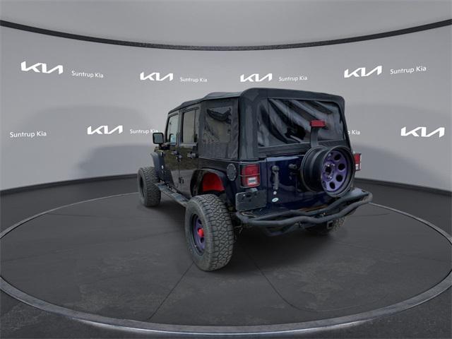 used 2012 Jeep Wrangler Unlimited car, priced at $14,995