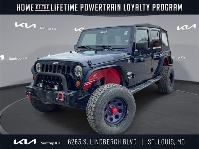 used 2012 Jeep Wrangler Unlimited car, priced at $14,995