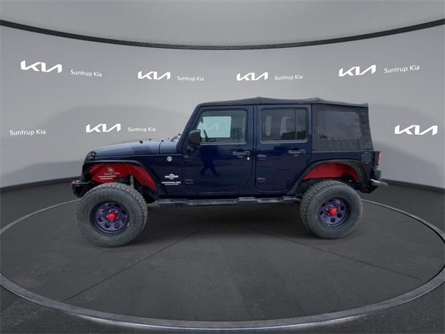 used 2012 Jeep Wrangler Unlimited car, priced at $14,995