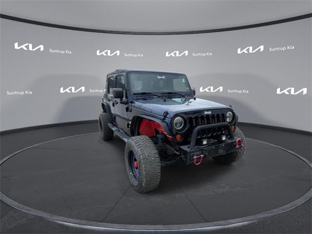 used 2012 Jeep Wrangler Unlimited car, priced at $14,995