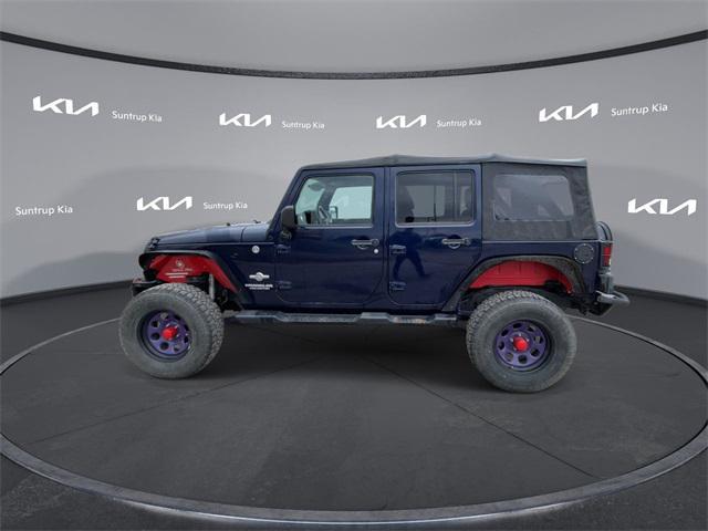 used 2012 Jeep Wrangler Unlimited car, priced at $14,995