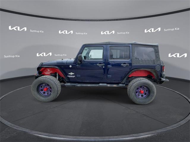 used 2012 Jeep Wrangler Unlimited car, priced at $14,995