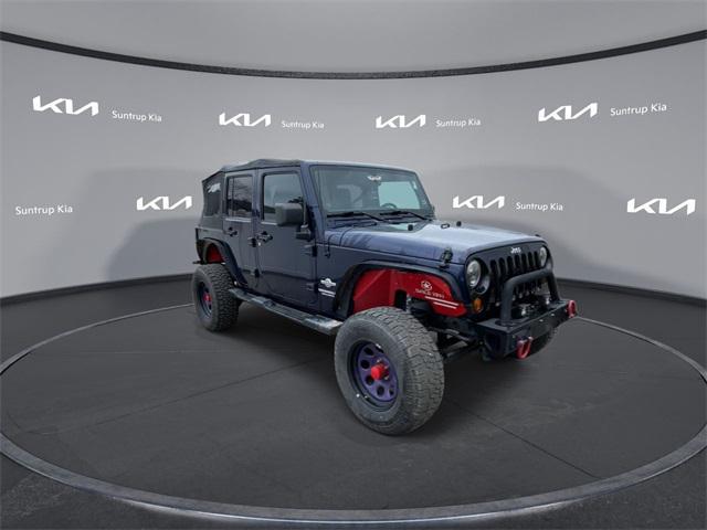 used 2012 Jeep Wrangler Unlimited car, priced at $14,995