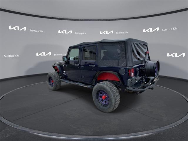 used 2012 Jeep Wrangler Unlimited car, priced at $14,995