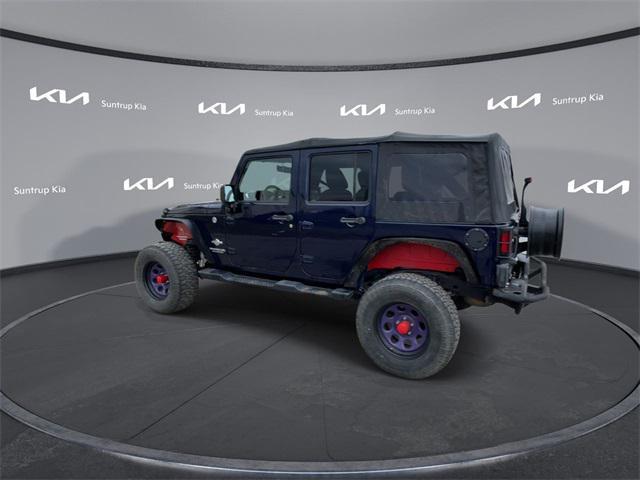 used 2012 Jeep Wrangler Unlimited car, priced at $14,995