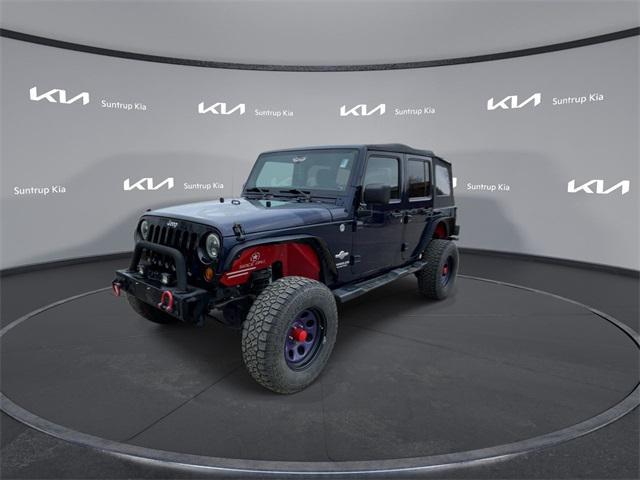 used 2012 Jeep Wrangler Unlimited car, priced at $14,995