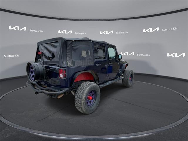 used 2012 Jeep Wrangler Unlimited car, priced at $14,995