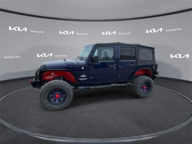 used 2012 Jeep Wrangler Unlimited car, priced at $14,995