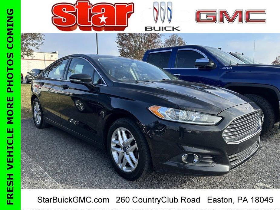 used 2015 Ford Fusion car, priced at $6,937