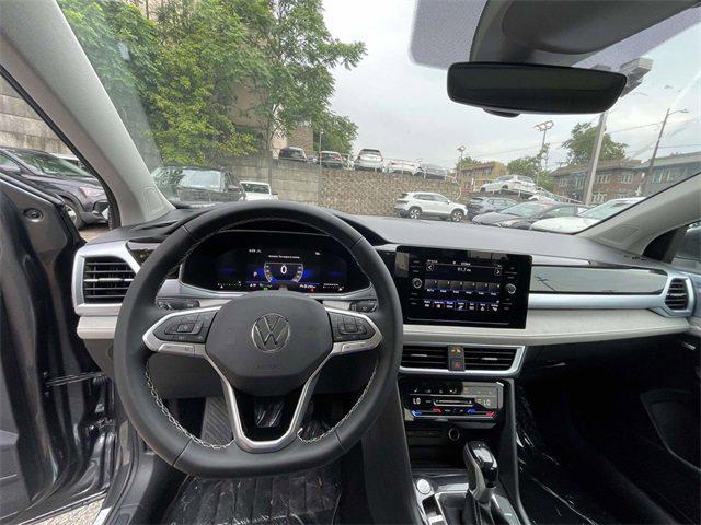 new 2025 Volkswagen Taos car, priced at $28,728